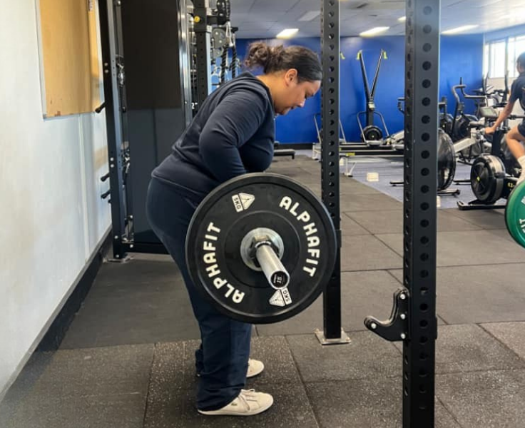 Female student demonstrating deadlift