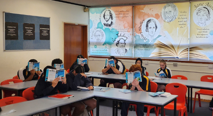 Students reading in classroom.