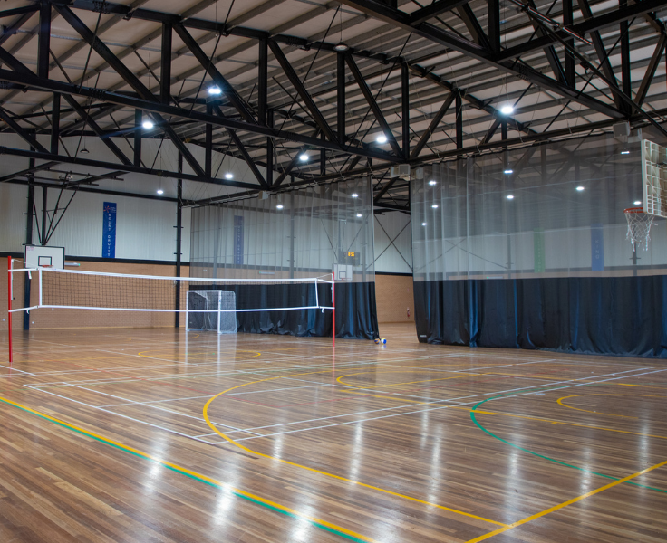 Photo of stadium set up for volleyball game