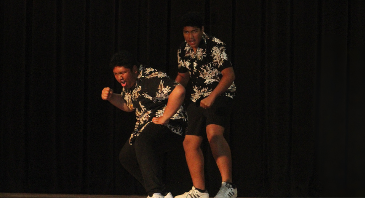 Two students performing Hakka.