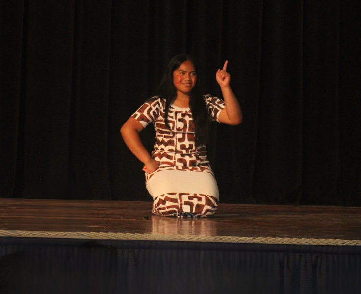 Female student performing traditional dance